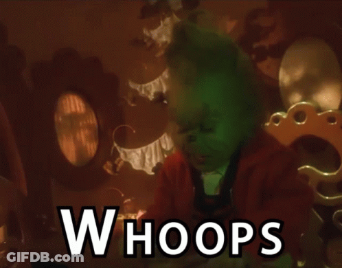 A Grinch Is Sitting In A Room With The Words Whoops Above Him GIF