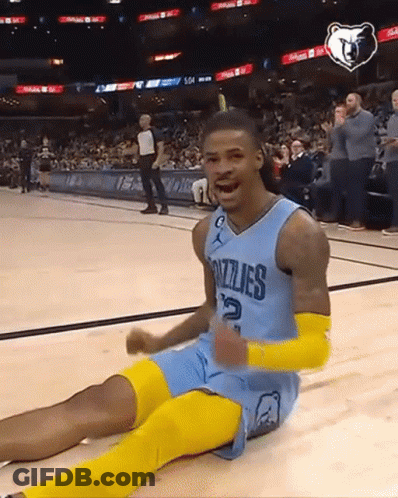 A Grizzlies Basketball Player Is Sitting On The Floor GIF