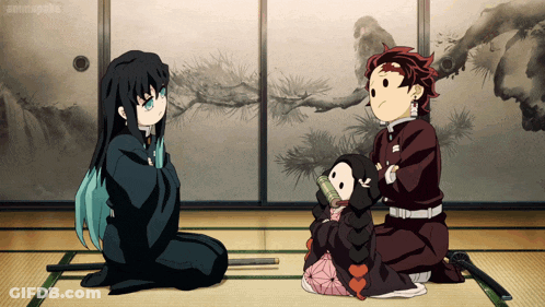 A Group Of Anime Characters Are Sitting On The Floor And One Of Them Is Holding A Small Doll GIF