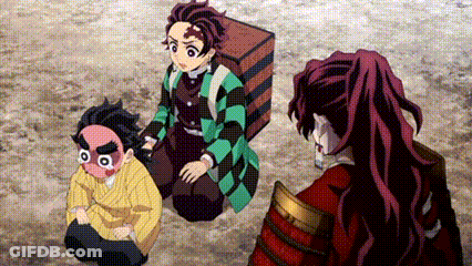 A Group Of Anime Characters Are Sitting On The Ground And Talking . GIF