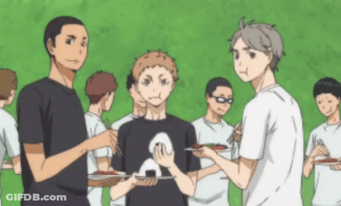 A Group Of Anime Characters Are Standing Around Eating GIF