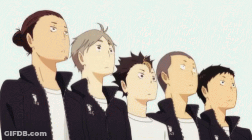 A Group Of Anime Characters Are Standing In A Line And Looking Up At The Sky . GIF