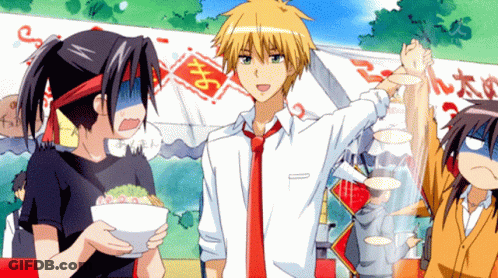 A Group Of Anime Characters Are Standing In Front Of A Sign That Says ' A ' On It GIF
