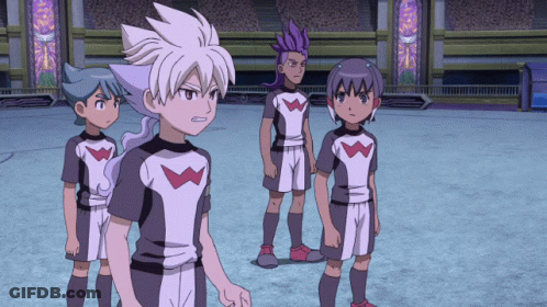 A Group Of Anime Characters Are Standing On A Field And One Of Them Has The Letter W On His Shirt GIF