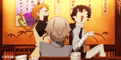 A Group Of Anime Characters Sitting At A Table With Chinese Writing On The Wall GIF