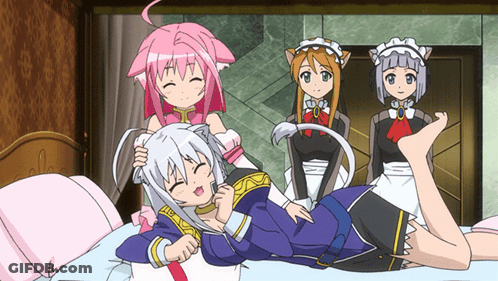 A Group Of Anime Girls Are Laying On A Bed And One Of Them Has A Cat Ear GIF