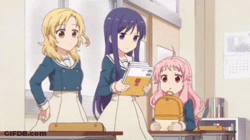 A Group Of Anime Girls Are Standing In A Classroom . GIF