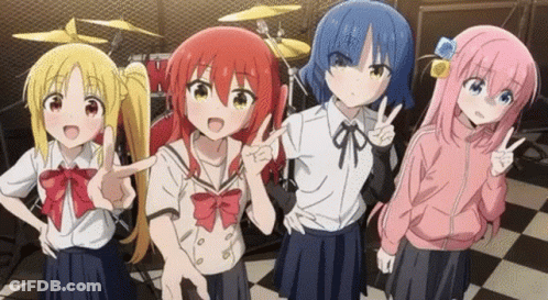 A Group Of Anime Girls Are Standing Next To Each Other In Front Of A Drum Set And Giving Peace Signs . GIF