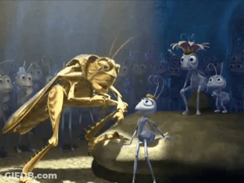 A Group Of Ants Wearing Crowns Are Standing Around A Small Ant Wearing A Crown GIF