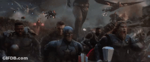 A Group Of Avengers Are Fighting Each Other In A Battle Scene GIF
