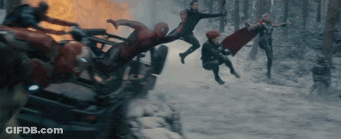 A Group Of Avengers Are Fighting Each Other In The Snow GIF