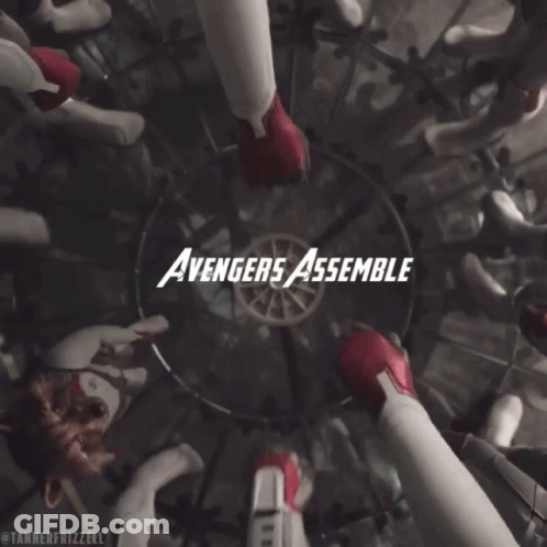 A Group Of Avengers Assemble In A Circle With Their Hands Together GIF