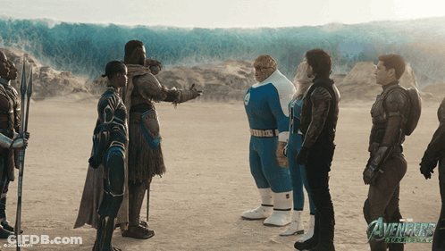 A Group Of Avengers Stand In A Desert GIF