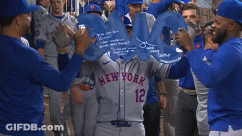 A Group Of Baseball Players Are Holding A Sign That Says Omg GIF