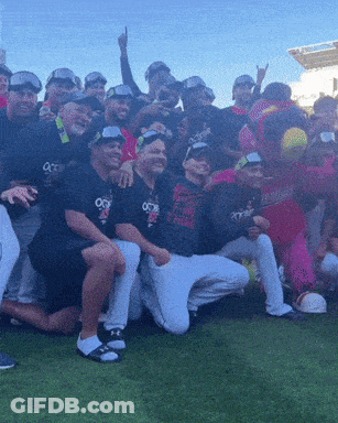 A Group Of Baseball Players Are Posing For A Picture With One Wearing A Shirt That Says O'neill GIF