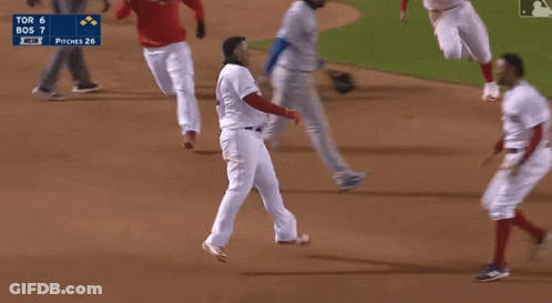 A Group Of Baseball Players Are Running On A Field With The Scoreboard Showing Tor 6 Bos 7 GIF