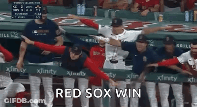 A Group Of Baseball Players Are Standing In A Dugout With Their Arms Outstretched . GIF