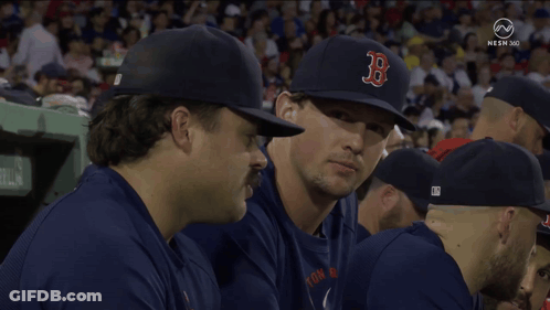 A Group Of Baseball Players Wearing Hats With The Letter B On It GIF