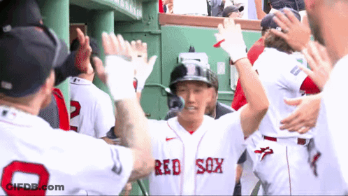A Group Of Baseball Players Wearing Red Sox Uniforms GIF