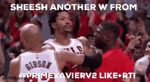 A Group Of Basketball Players Are Hugging Each Other In Front Of A Crowd GIF
