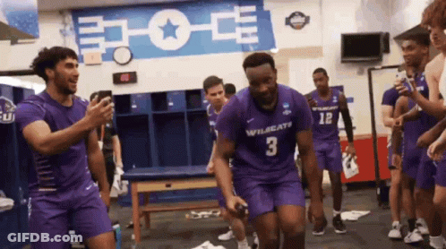 A Group Of Basketball Players Are In A Locker Room And One Of Them Is Wearing A Number 3 Jersey GIF