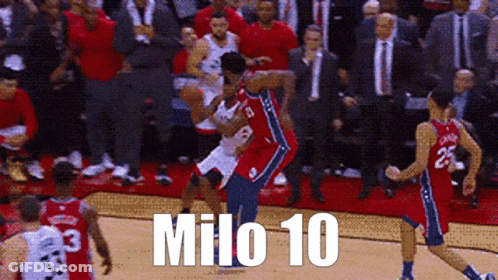 A Group Of Basketball Players Are Playing A Game And One Of Them Has The Number 10 On His Jersey GIF