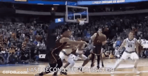 A Group Of Basketball Players Are Playing A Game Of Basketball And The Last Second Buzzer Beater Is Being Shouted . GIF