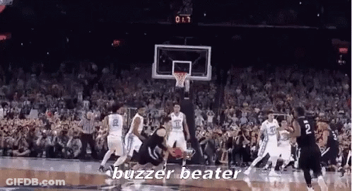 A Group Of Basketball Players Are Playing A Game Of Basketball And The Words Buzzer Beater Are On The Screen . GIF