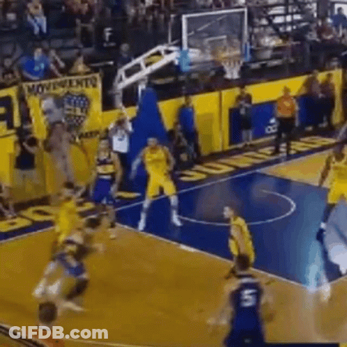 A Group Of Basketball Players Are Playing A Game On A Basketball Court . GIF
