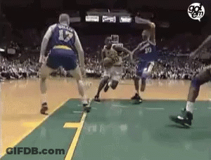 A Group Of Basketball Players Are Playing A Game On A Court . One Of The Players Has The Number 17 On His Jersey . GIF