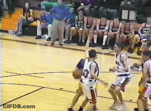 A Group Of Basketball Players Are Playing On A Court And One Of Them Is Wearing A Jersey With The Number 23 On It GIF