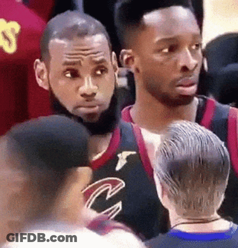 A Group Of Basketball Players Are Standing Next To Each Other And One Of Them Has A Beard . GIF