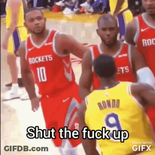 A Group Of Basketball Players Are Standing On A Court And One Of Them Is Talking To Another Player . GIF