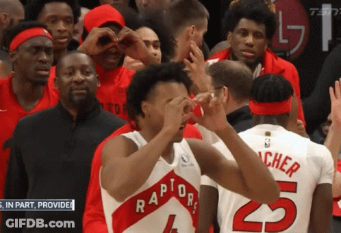 A Group Of Basketball Players Including One Wearing Number 5 GIF