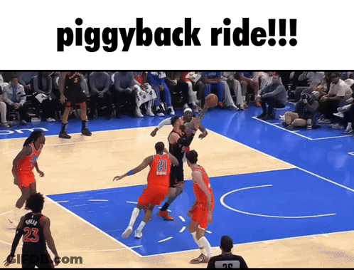 A Group Of Basketball Players On A Court With The Words Piggyback Ride Below Them GIF