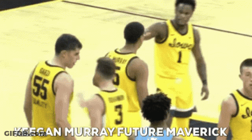 A Group Of Basketball Players Standing On A Court With The Words Keegan Murray Future Maverick Written On The Bottom GIF