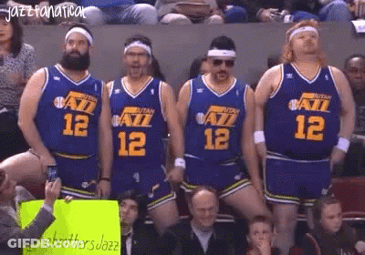 A Group Of Basketball Players Wearing Utah Jazz Uniforms GIF