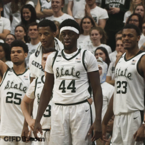 A Group Of Basketball Players Wearing White Jerseys That Say State GIF