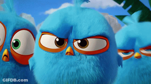 A Group Of Blue Angry Birds Are Looking At The Camera GIF