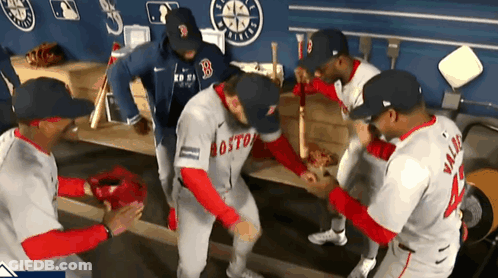 A Group Of Boston Red Sox Baseball Players Are Dancing GIF
