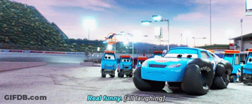 A Group Of Cars Are On A Race Track And One Of Them Says " Real Funny " GIF