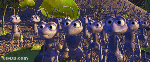 A Group Of Cartoon Ants Are Standing In A Line GIF