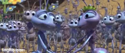 A Group Of Cartoon Ants Are Standing Next To Each Other . GIF