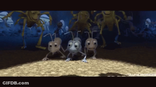 A Group Of Cartoon Ants Are Walking In A Dark Room With A Spider In The Background GIF