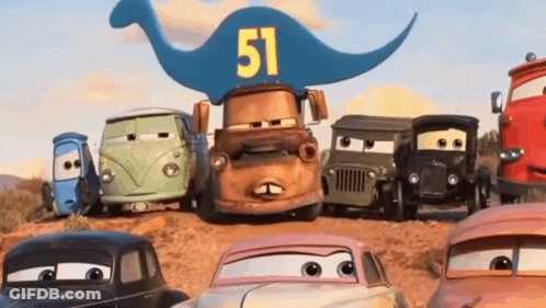 A Group Of Cartoon Cars Are Standing Next To Each Other On A Dirt Road . GIF