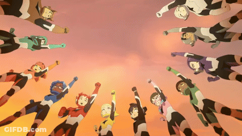 A Group Of Cartoon Characters Are Flying In The Air And One Of Them Has The Letter T On His Chest GIF