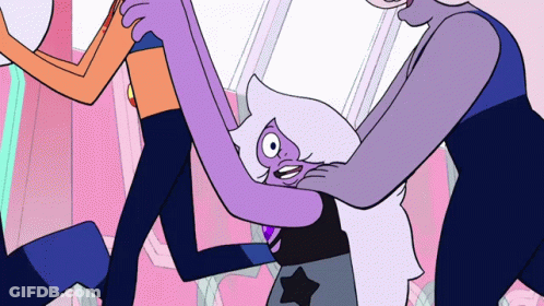 A Group Of Cartoon Characters Are Hugging Each Other And One Of Them Has A Star On Her Pants GIF