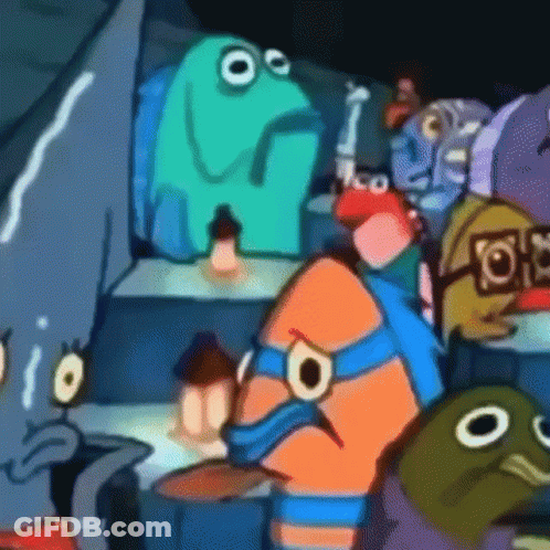 A Group Of Cartoon Characters Are Sitting Around A Table In A Dark Room . GIF