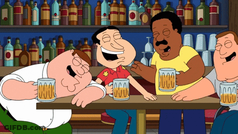A Group Of Cartoon Characters Are Sitting At A Table Holding Mugs Of Beer GIF