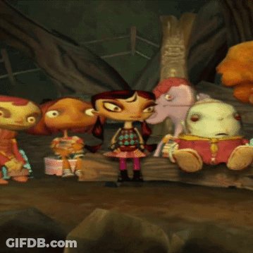 A Group Of Cartoon Characters Are Sitting On A Rock GIF